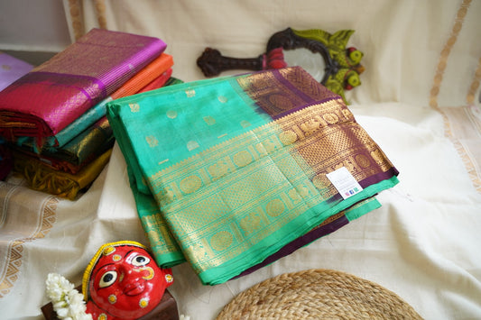 Leaf Green Butta Kanchi Silk Cotton Saree With Zari Border PC11250