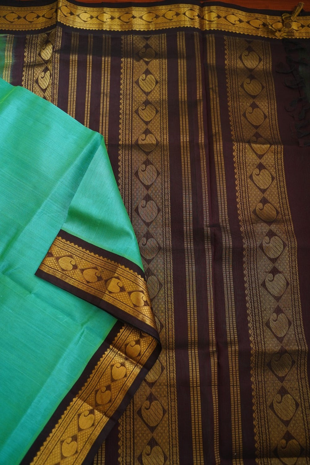 Green  Kanchi  Silk Cotton Saree With Zari Border  PC10456